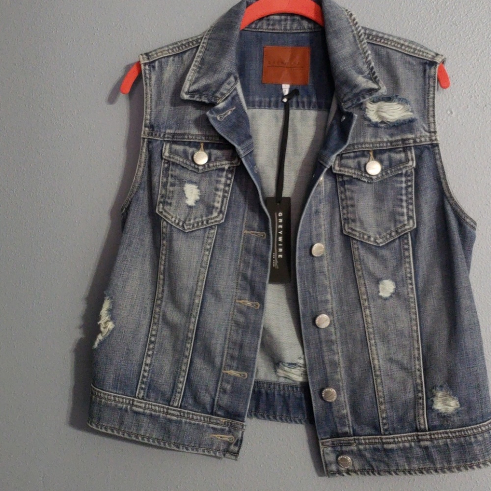 Distressed denim vest
